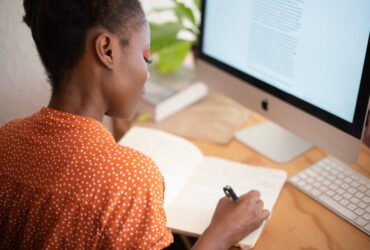 woman writing on her notebook Photo by RF._.studio on Pexels.com
